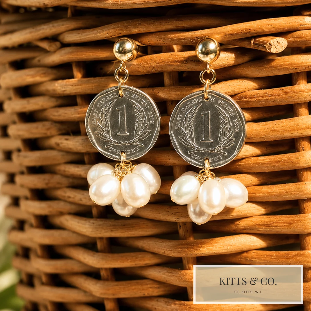 Coin and pearl earrings on wicker