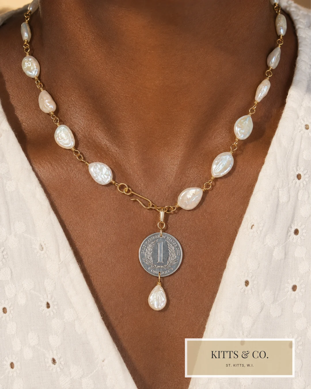 Pearl and coin necklace worn on skin